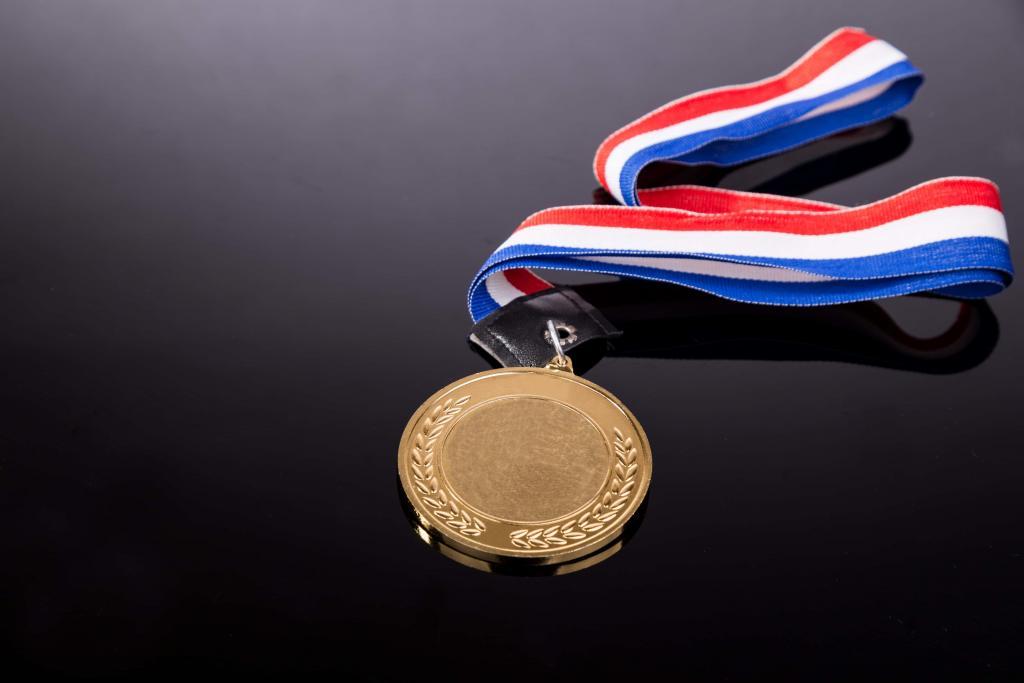 generic-sporting-event-gold-medal-with-red-and-P725MK7-min